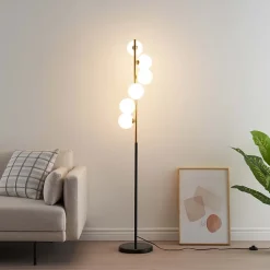 Lampadaire design noir et laiton sphères blanches - Sierra