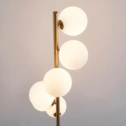 Lampadaire design noir et laiton sphères blanches - Sierra