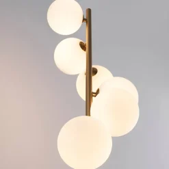 Lampadaire design noir et laiton sphères blanches - Sierra