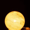 Lampe boule à poser en verre jaune 20x20x18 cm