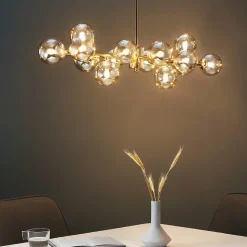 Lustre design doré chaleureux à 14 sphères - Osanna