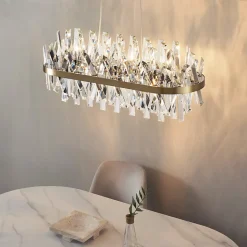 Lustre doré en cristal pampilles transparentes - Ariella