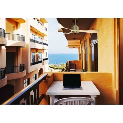 Modulo Regular Exterior - un ventilateur pour extérieur IP44, DC 132 cm Laiton pales abs marron clair sans Lumière 20 à 30 m²