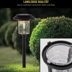 Piquet de terre décoratif solaire 'SIMON' 54,7 cm de haut, en métal noir et verre structuré, LED intégrée, blanc chaud