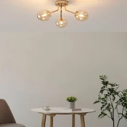 Plafonnier doré à 3 sphères en verre ambré - Ottavia