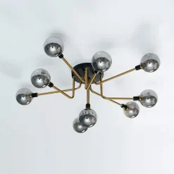 Plafonnier moderne noir et doré 9 boules en verre ambré - Merano